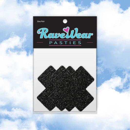 Packaged Glitter Cross Brilliant Black Pasties on a cloudy background